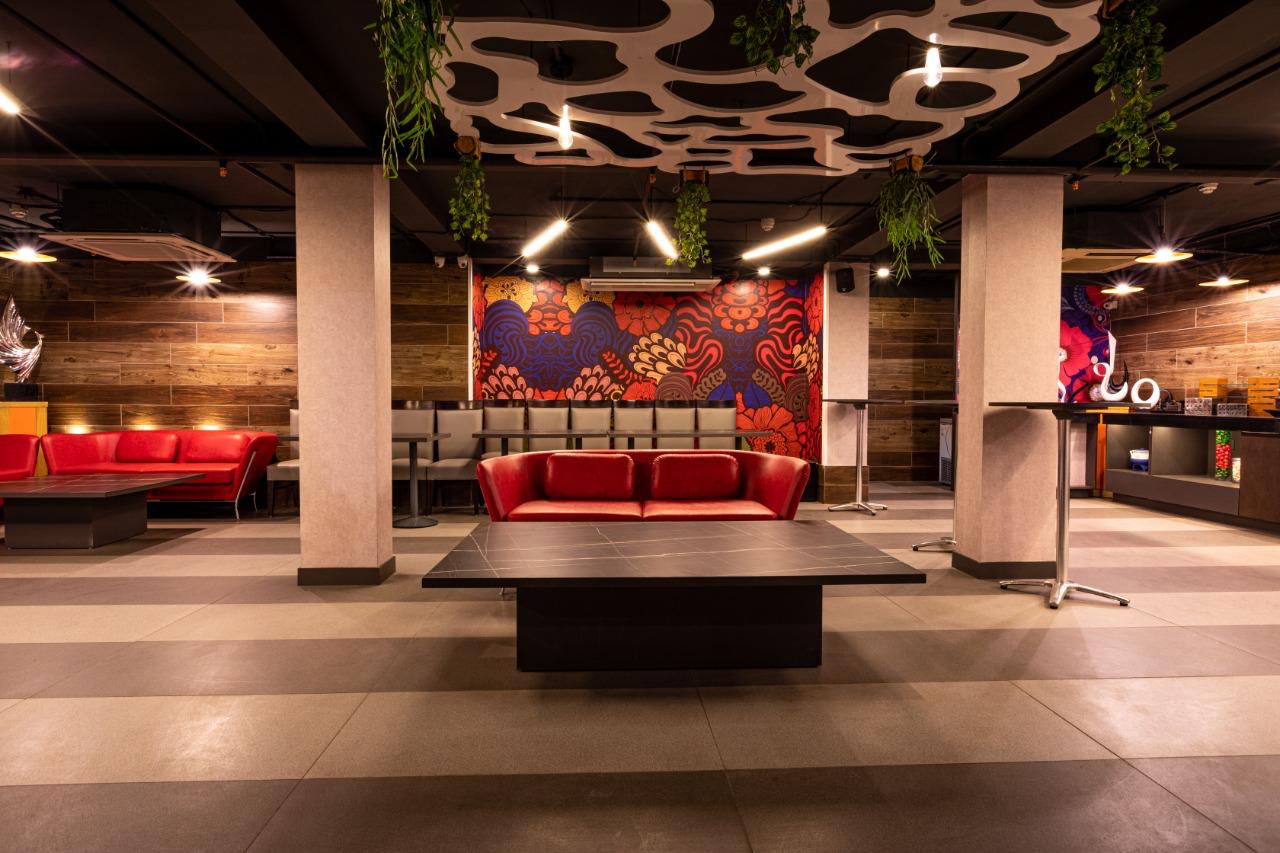 Khidmat Delhi lounge seating with floral wall art